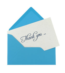 thank you note in a blue envelope isolated on white